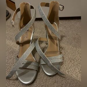 Women’s Silver Glitter Heels, only worn once! Great strappy heels. Size 9.